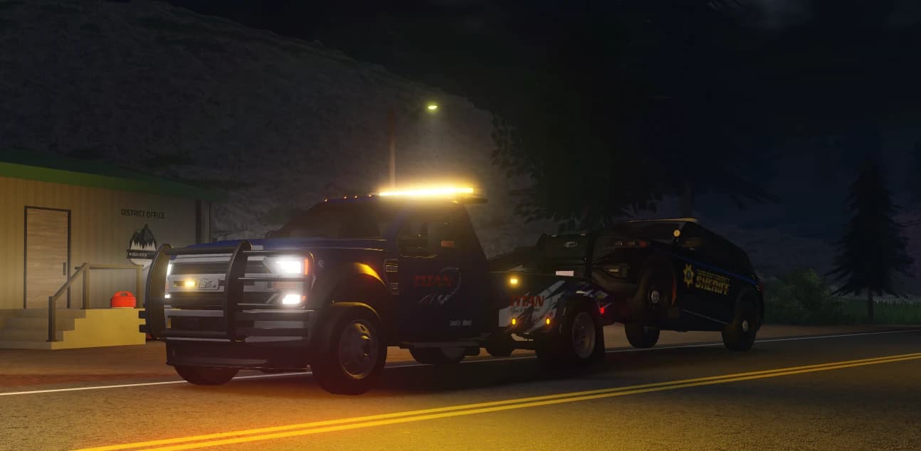 Titan Towing recovering a Tarrant County Sheriff vehicle at night