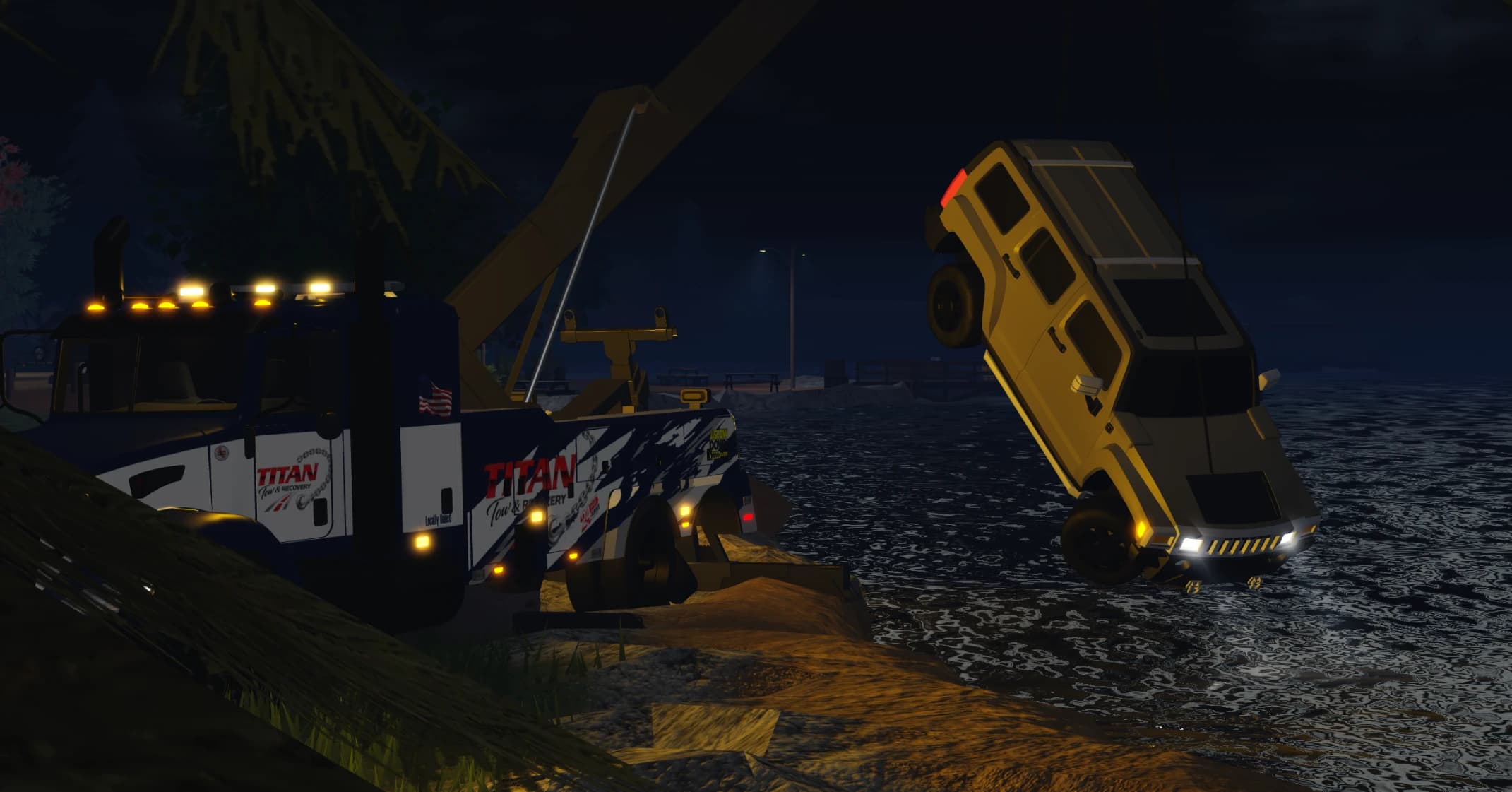 A Titan recovery truck lifting a yellow SUV out of the water